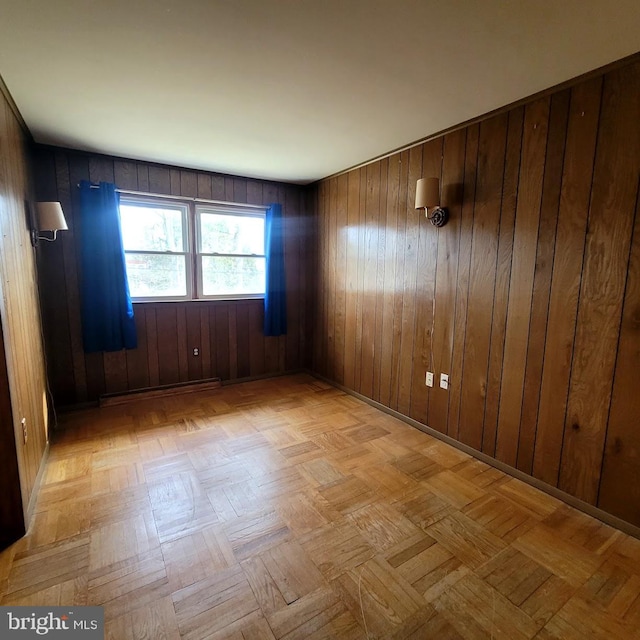 empty room with light parquet flooring