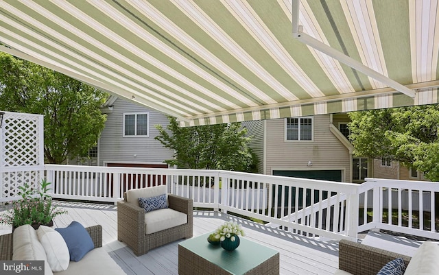 wooden deck with outdoor lounge area