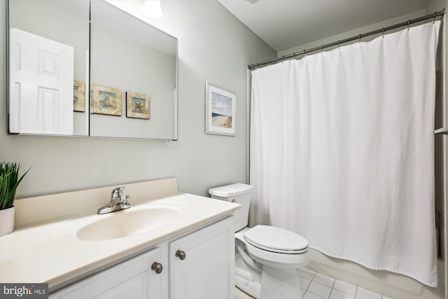 full bath with toilet, tile patterned flooring, vanity, and shower / tub combo with curtain