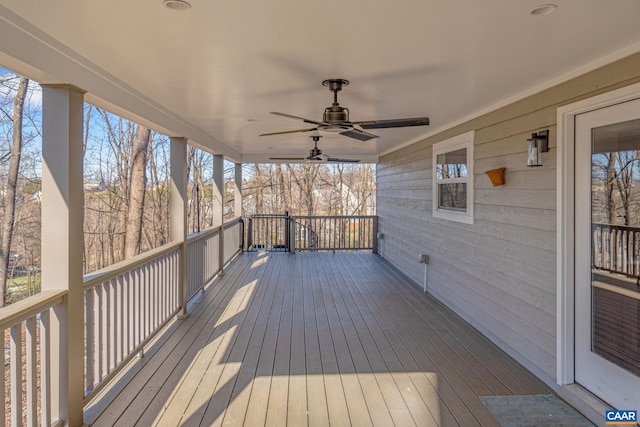 wooden deck with ceiling fan