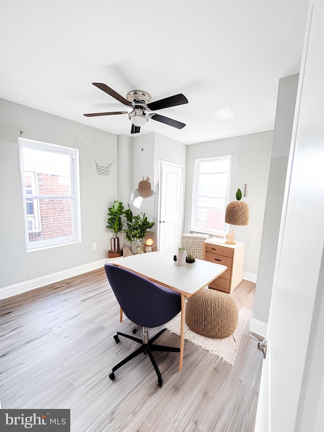 office area with light hardwood / wood-style flooring