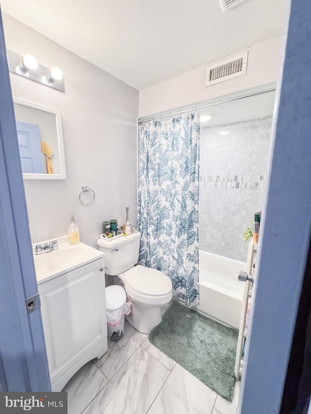 full bathroom with shower / bath combination with curtain, vanity, and toilet