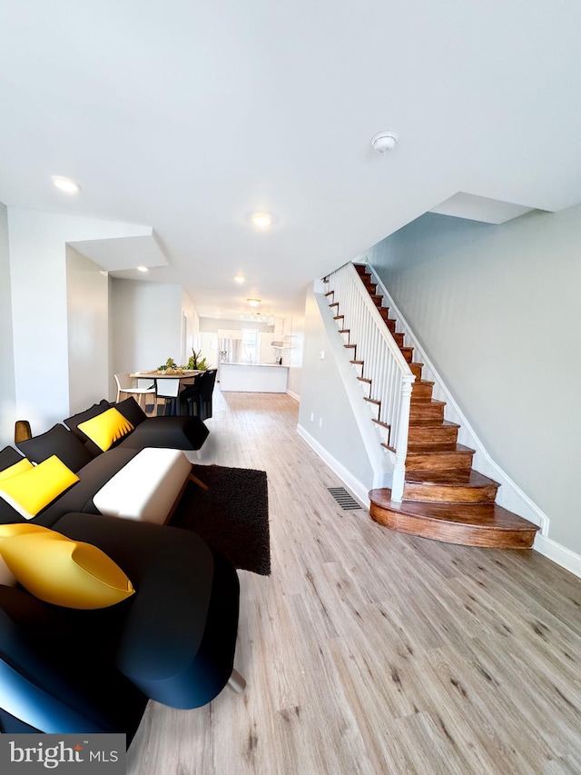 living room featuring light hardwood / wood-style flooring