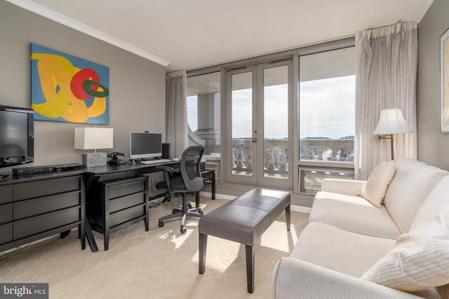 office space with crown molding, light carpet, and french doors