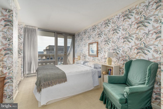 carpeted bedroom featuring crown molding