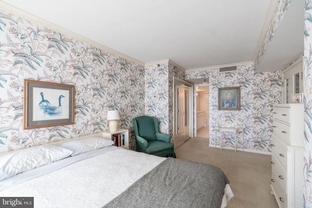 bedroom with crown molding and carpet