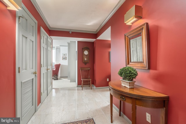 corridor featuring ornamental molding