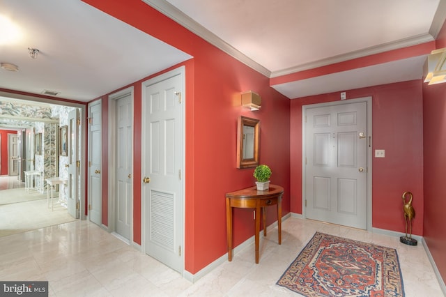 foyer with ornamental molding