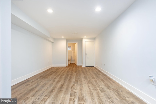 spare room featuring light hardwood / wood-style floors