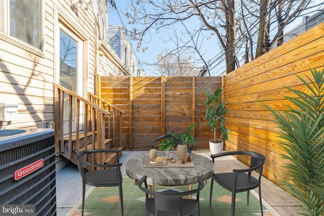 view of patio / terrace featuring central AC unit