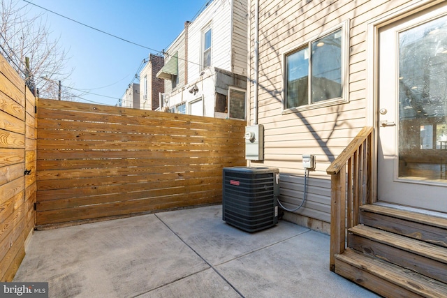 view of patio / terrace with central air condition unit