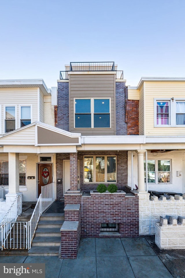 multi unit property featuring covered porch