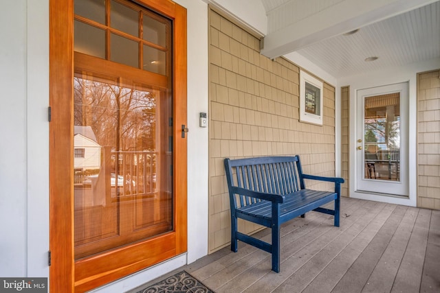 doorway to property with covered porch