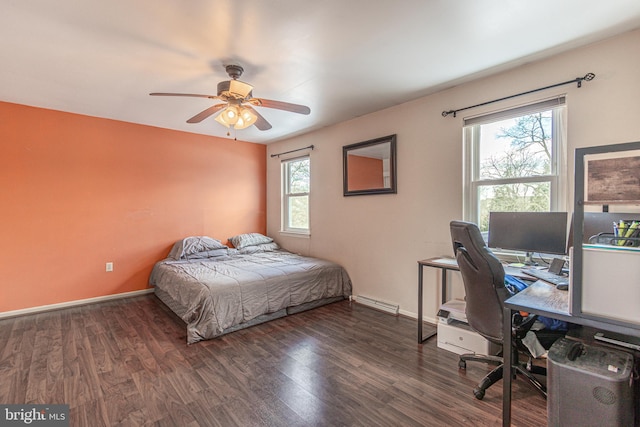 bedroom featuring dark hardwood / wood-style floors and ceiling fan