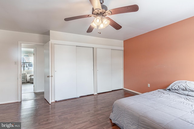 bedroom with ceiling fan and dark hardwood / wood-style flooring