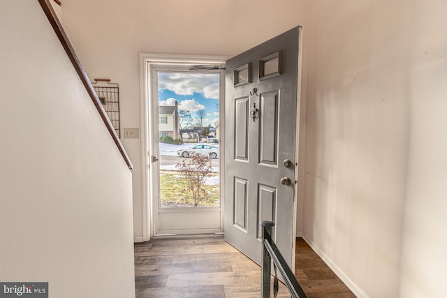 doorway to outside featuring hardwood / wood-style flooring