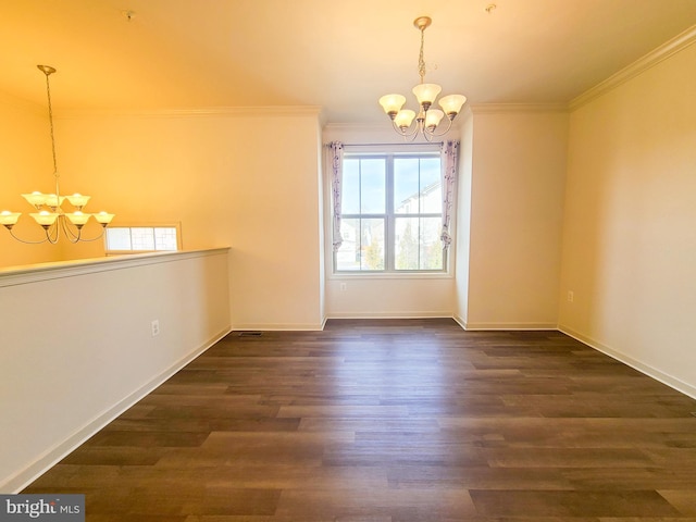 unfurnished dining area with crown molding, dark hardwood / wood-style floors, and a notable chandelier