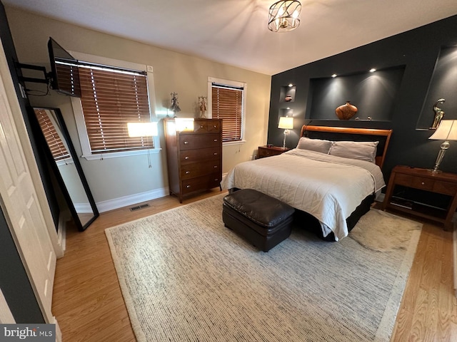 bedroom featuring light hardwood / wood-style flooring