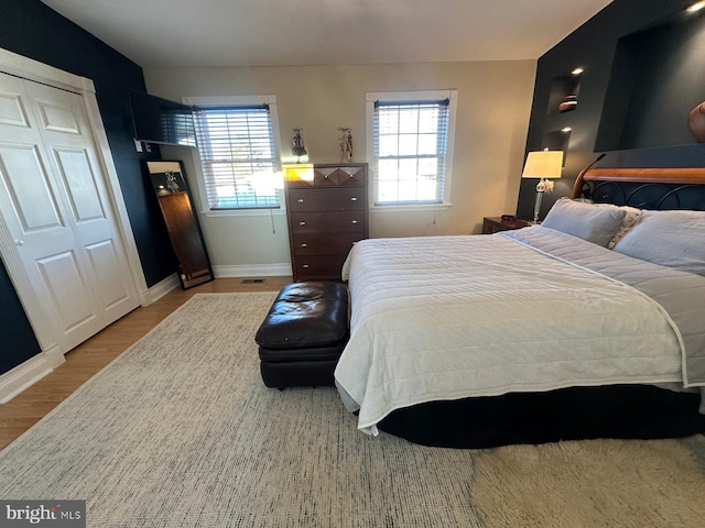 bedroom featuring light wood-type flooring