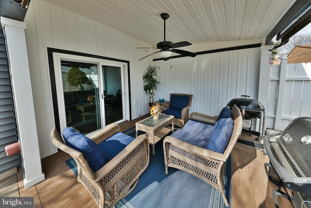 view of patio with area for grilling and ceiling fan