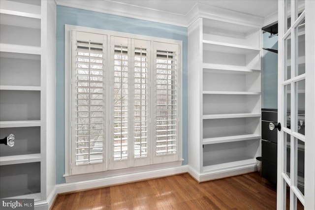 walk in closet featuring hardwood / wood-style flooring