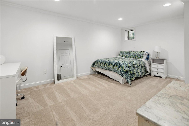 bedroom with crown molding and carpet