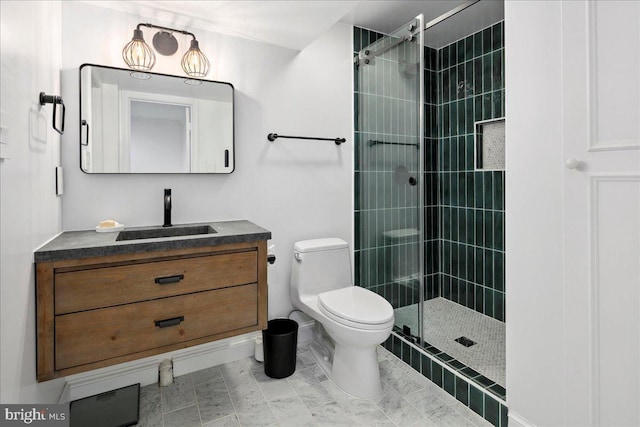 bathroom featuring vanity, an enclosed shower, and toilet