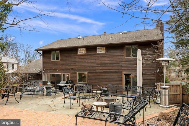 rear view of house featuring a patio area