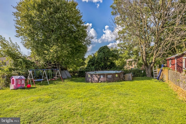 view of yard with a playground