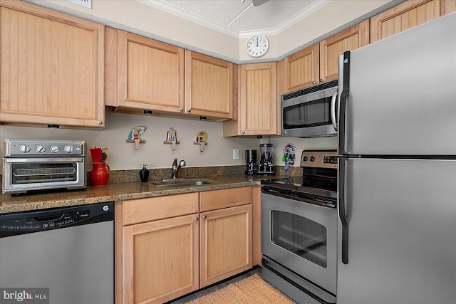 kitchen with crown molding, appliances with stainless steel finishes, sink, and light brown cabinetry