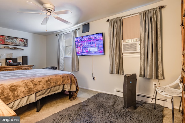 carpeted bedroom featuring ceiling fan and baseboard heating