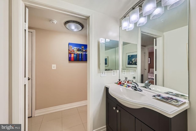 bathroom featuring vanity and tile patterned flooring