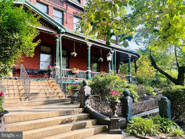 exterior space featuring covered porch