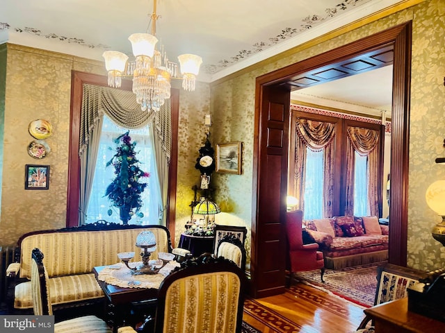 dining room featuring hardwood / wood-style flooring and a chandelier