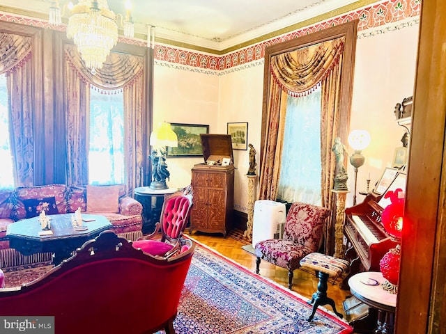 living area featuring parquet floors and a chandelier