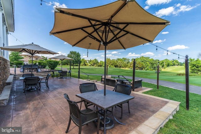 view of patio with outdoor dining area