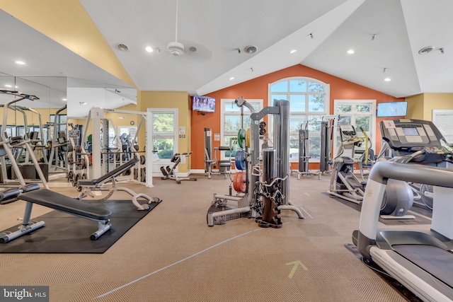 exercise room featuring vaulted ceiling, recessed lighting, visible vents, and baseboards