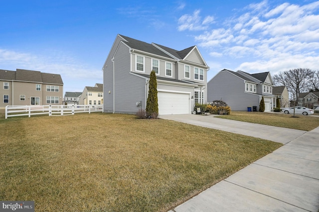 view of side of property with a garage and a yard