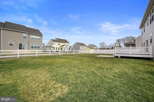 view of yard with a deck