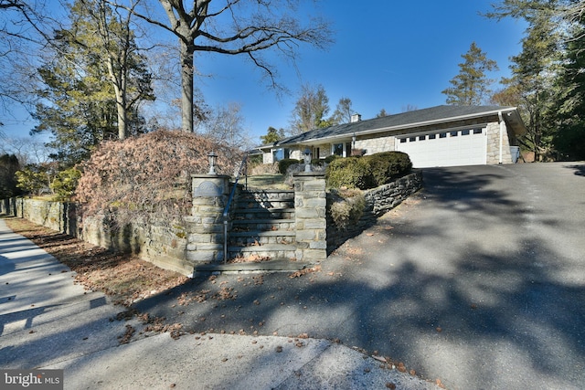 view of front of property featuring a garage