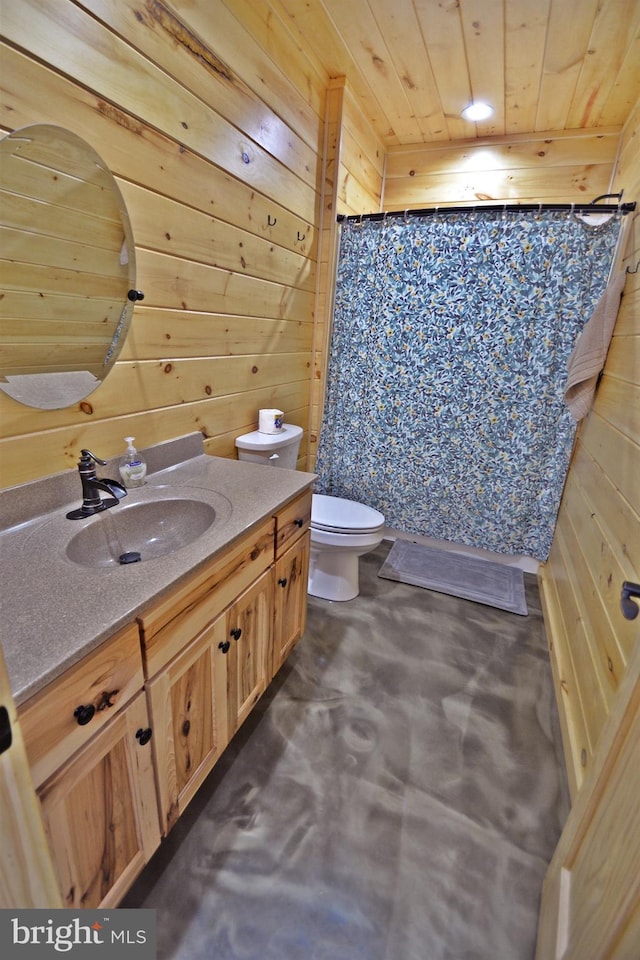 bathroom featuring walk in shower, toilet, wood ceiling, vanity, and wooden walls