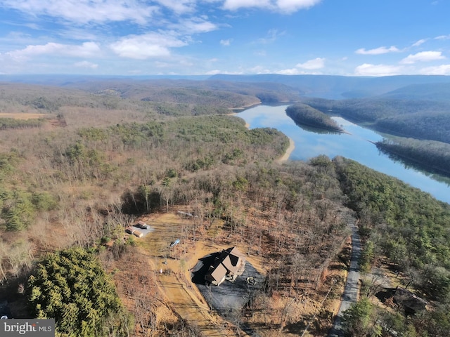 aerial view featuring a water and mountain view