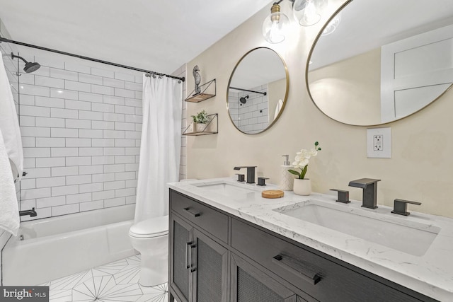 full bathroom featuring vanity, shower / tub combo, tile patterned floors, and toilet