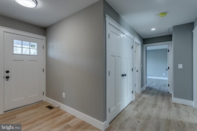 entrance foyer with light wood-type flooring