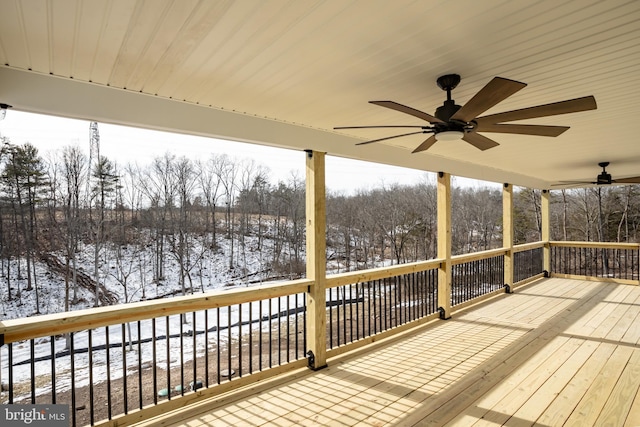 snow covered deck with ceiling fan