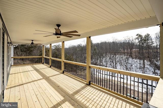 wooden terrace with ceiling fan