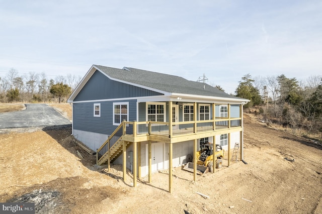 back of house with a garage