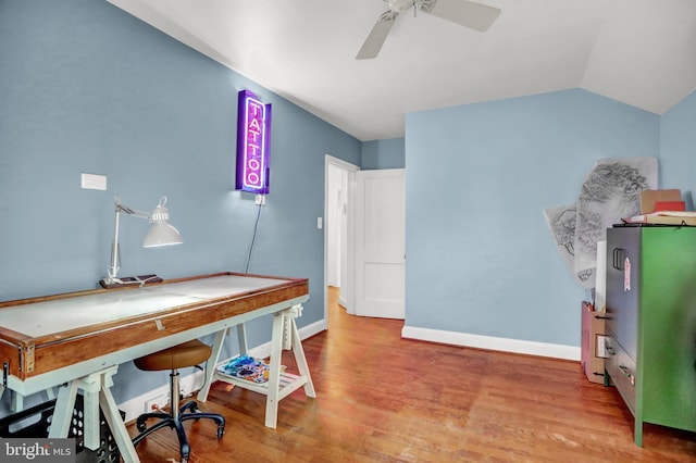 office area featuring lofted ceiling, hardwood / wood-style floors, and ceiling fan