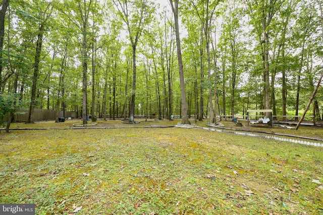 view of yard with fence