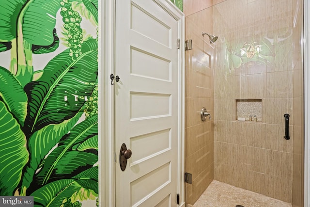 bathroom featuring a shower stall